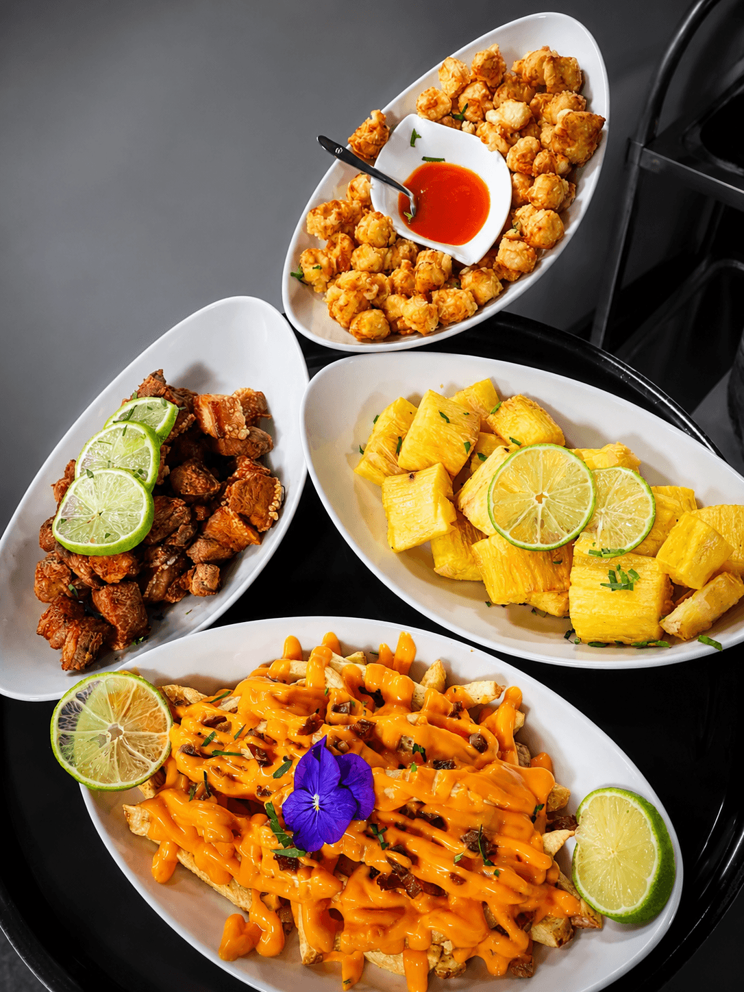 Porções e petiscos da Araucária Petiscaria, restaurante no Montijo
